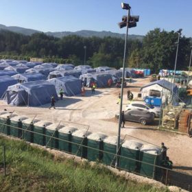 Teams of rescue and construction workers, aided by volunteer supporters, construct a temporary encampment to help the displaced residents of Amatrice, Italy Aug. 27, 2016, recover from a 6.2 magnitude earthquake that shook the town just four days earlier. The earthquake reduced numerous buildings to piles of rubble, many of which were built in the 16th century, and left approximately 2,500 residents homeless. (U.S. Army photo by Staff Sgt. Joshua Tverberg - 160827-A-ED313-003)